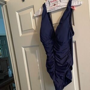 Elegant Navy One-Piece Swimsuit
PRICE FIRM